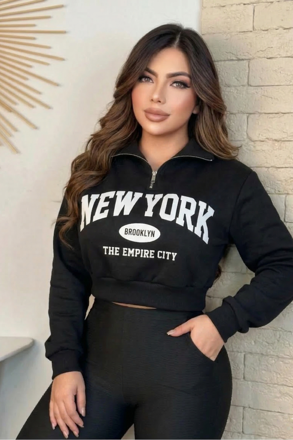 Buzo con cremallera y estampado