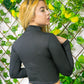 Blusa larga al cuerpo cuello alto