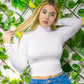 Blusa larga al cuerpo cuello alto
