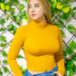 Blusa larga al cuerpo cuello alto
